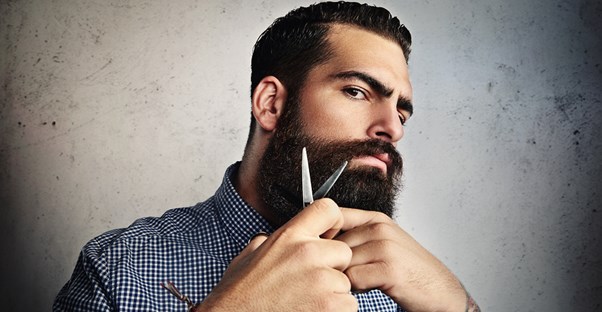 a man sculpting a no shave november beard