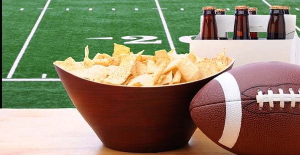 Chips and beer at a Super Bowl watch party.