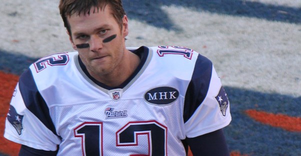 Tom Brady on a football field
