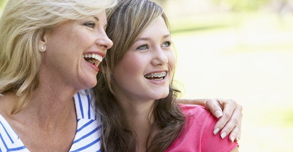 a parent talking to her teen about STIs
