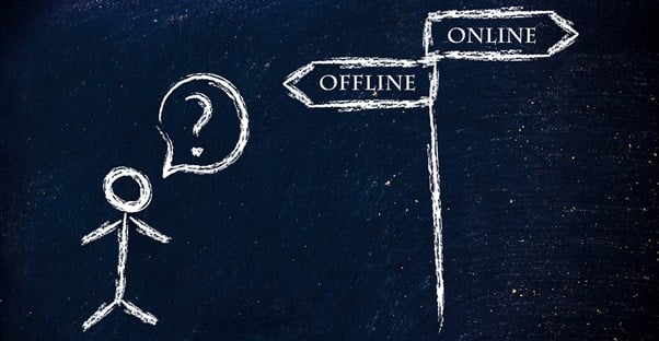 A stick man questions whether he should go in the direction of offline or online