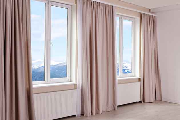 Use Insulated Curtains