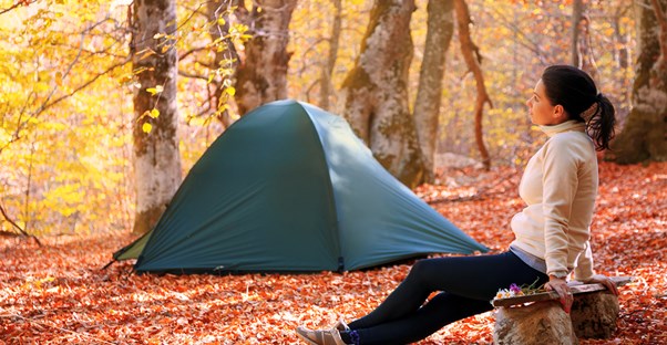 Woman wonders what she forgot to pack for her fall camping trip
