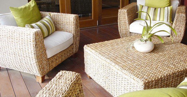 Patio furniture that has been protected by outdoor furniture covers.