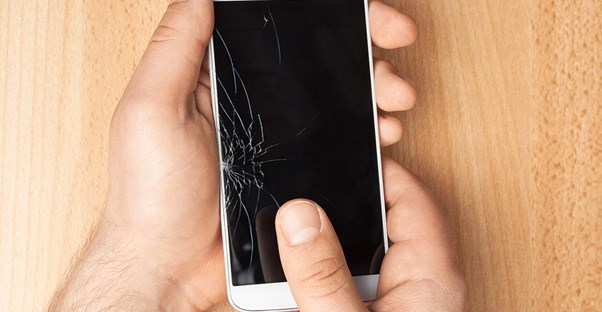 phone with a broken screen that would be repaired by cell phone insurance