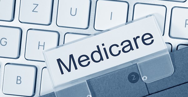 Label of medicare sitting on a keyboard