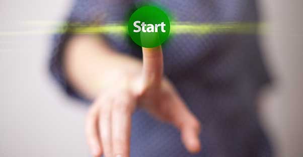 Green start button symbolizing the registration process
