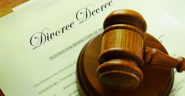 Gavel resting on top of a finalized divorce decree