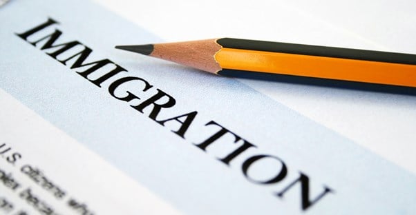 a form titled immigration with a pencil resting on it