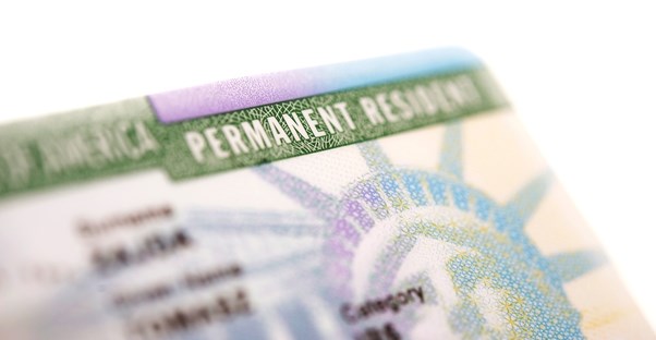 a zoomed in portion of a U.S. permanent resident card