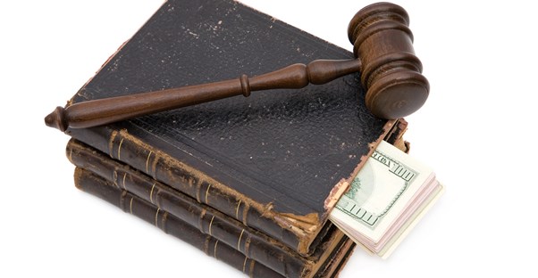 Law books, money, and a gavel