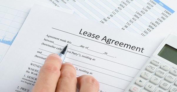 A tenant reviewing a lease agreement