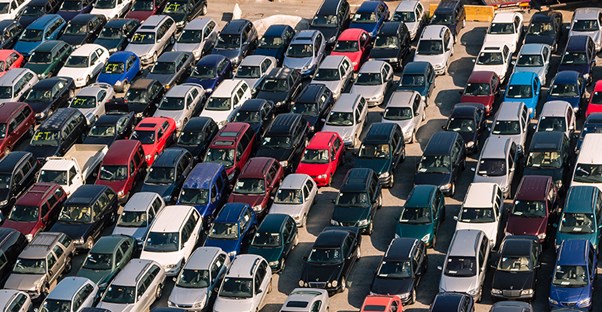 an aerial view of various cars lined up in lines and rows ready for local government vehicle auctions