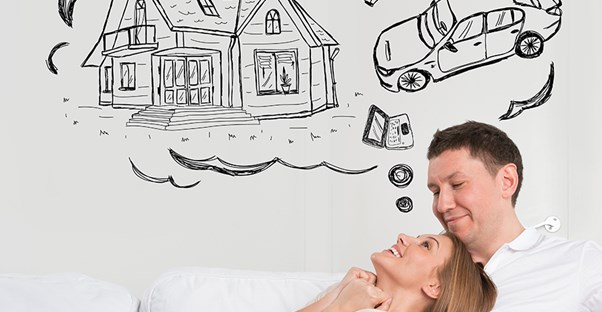 couple dreaming of a car and house. building credit