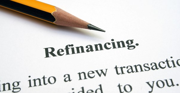 Sharpened pencil pointing to refinancing