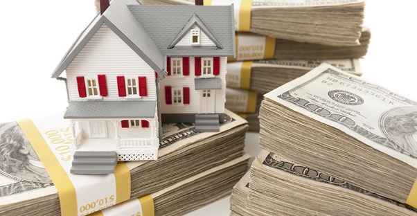 a visual representation of VA loans consisting of dollar bills and a model house