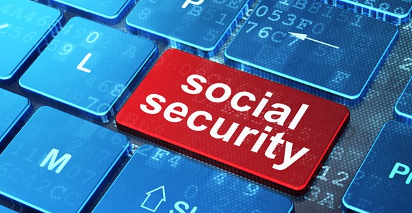 A red social security computer button suggests there are disadvantages to social security disability