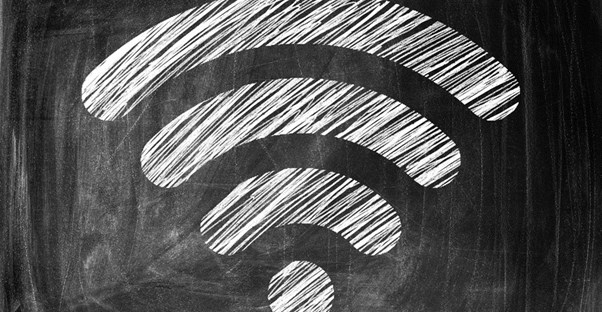 A wifi symbol drawn on a chalkboard to represent an internet speed.