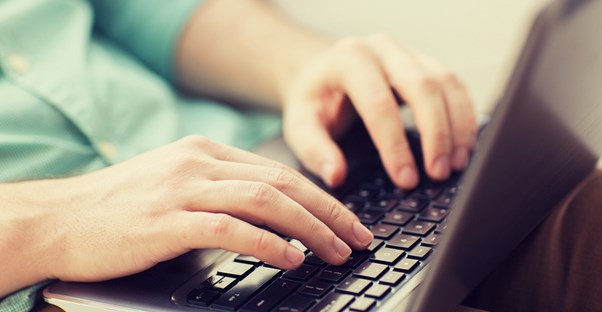 An aspiring ESL teacher works online to obtain their ESL certification online