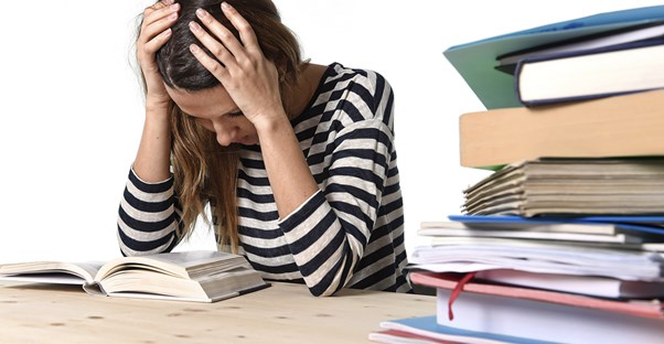 Young student gets stressed because she studies wrong