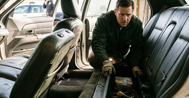 I Bought a Government Surplus Crown Victoria. What I Found Behind the Rear Seat Required a Call to the Police.