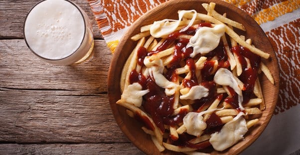 Poutine, a Canadian invention, needs to be assimilated into American culture.