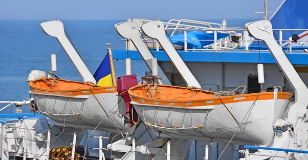 lifeboats hanging from a Caribbean cruise ship