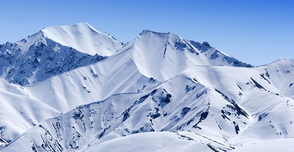 a snow covered mountain range