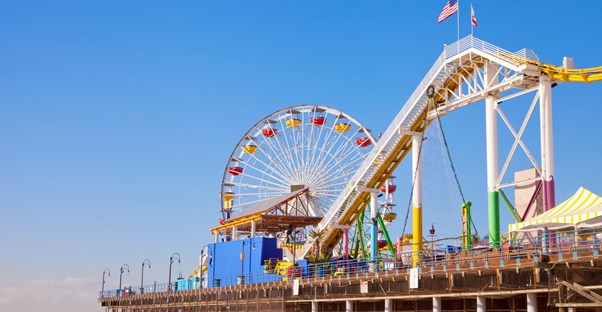 a ferris wheel and roller coaster on the santa monica pier