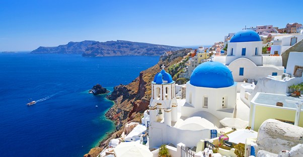 a beautiful view of a honeymoon destination on the Greek Mediterranean coast