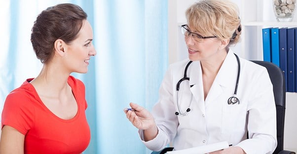 A doctor and patient discuss laparoscopy