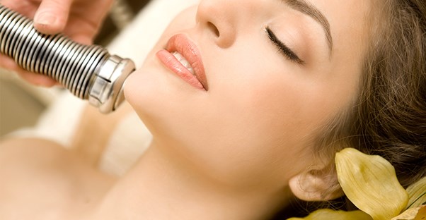 A woman undergoing electrolysis