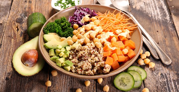 Mixed bowl of animal-friendly food. Vegan vs vegetarian.