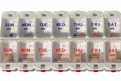 common medications in a pill dispenser
