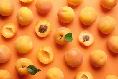 apricots on an orange background