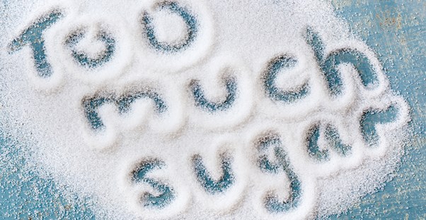 a table covered in sugar, representing foods that are deceptively unhealthy