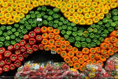 bell peppers displayed at a grocery store