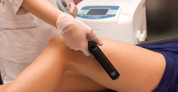 a woman in a laser hair removal session