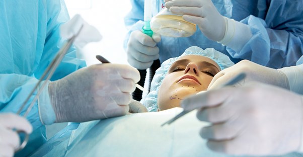 a woman about to undergo rhinoplasty