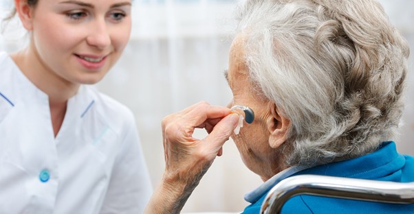 a woman who is curious about hearing aids and medicare