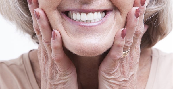 a woman who knows how much dentures cost