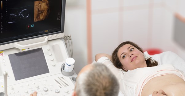 A doctor uses a 3D ultrasound